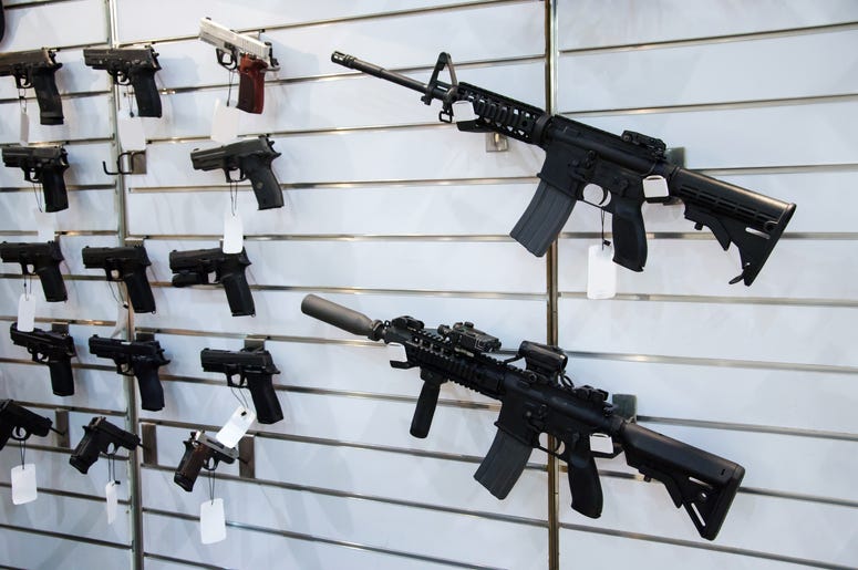 (artas/ iStock/ Getty Images Plus) Weapons on display at a gun store
