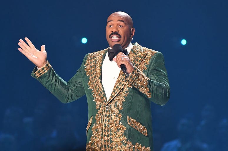 (Paras Griffin/Getty Images) Steve Harvey speaks onstage during 2019 Miss Universe Pageant at Tyler Perry Studios on December 08, 2019 in Atlanta, Georgia.