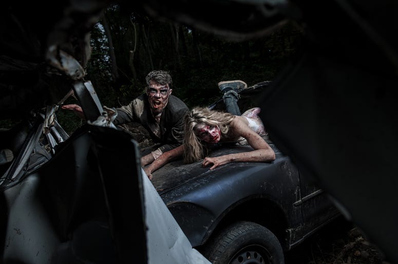 (bmcent1/ iStock/ Getty Images Plus) Moonlit Zombies In Car Crash Carnage