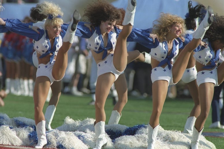 (Rick Stewart /Allsport/ Getty Images) The Dallas Cowboys cheerleaders perform during Super Bowl XXVII against the Buffalo Bills at the Rose Bowl in Pasadena, California. The Cowboys won the game, 52-17.