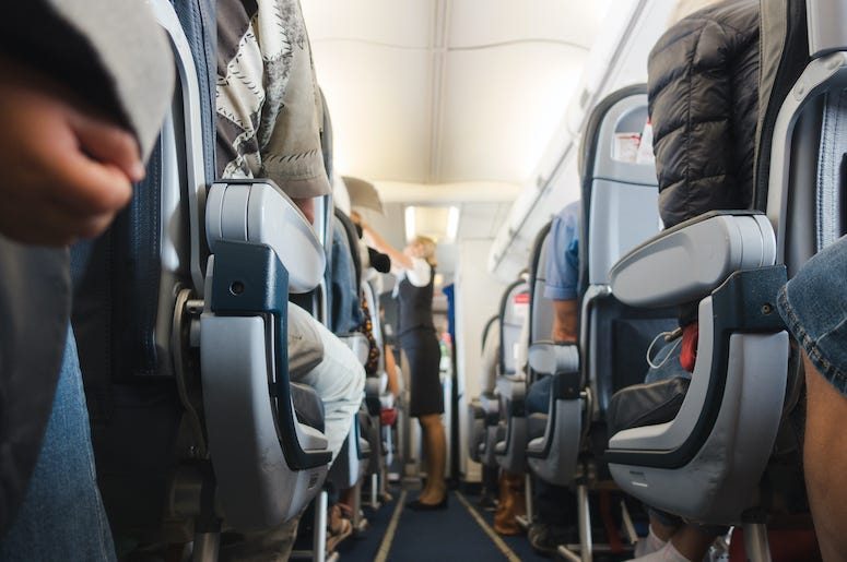 Cabin Aisle, Flight Attendant, Airplane Cabin, Passengers Cabin Aisle, Flight Attendant, Airplane Cabin, Passengers