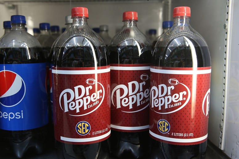 (Joe Raedle/ Getty Images) Bottles of Dr Pepper drinks are seen on a store shelf on the day Keurig Green Mountain announced it has struck a deal worth more than $21 billion with Dr Pepper Snapple Group Inc. on January 29, 2018 in Miami, Florida.