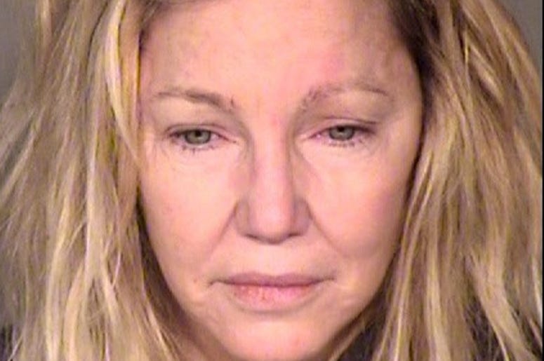 VENTURA, CA - JUNE 24: (EDITORS NOTE: Best quality available) In this handout photo provided by the Ventura County Sheriffs Office, actress Heather Locklear is seen in a police booking photo after her arrest on two counts of misdemeanor battery on a polic VENTURA, CA - JUNE 24: (EDITORS NOTE: Best quality available) In this handout photo provided by the Ventura County Sheriffs Office, actress Heather Locklear is seen in a police booking photo after her arrest on two counts of misdemeanor battery on a polic
