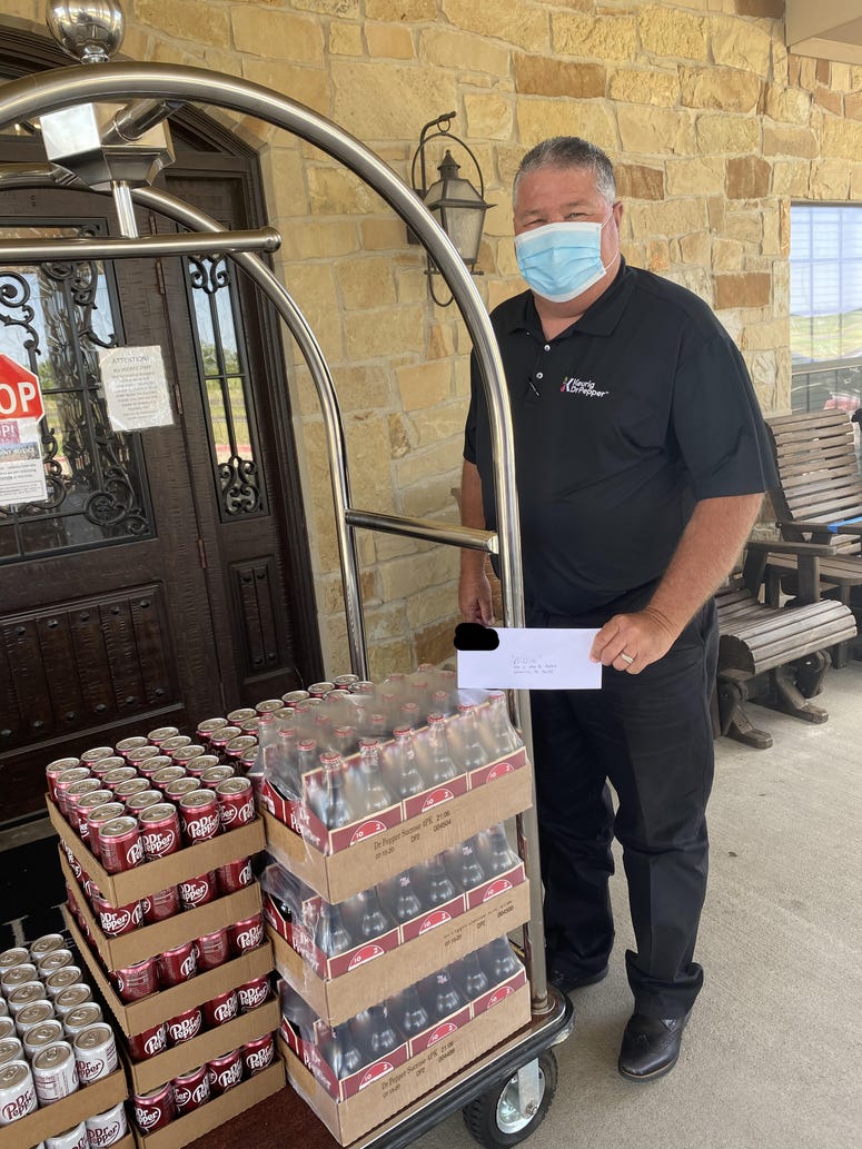 (Photo courtesy of Katie-Rose Watson/ Hillside Medical Lodge) Dr. Pepper delivers 16 cases of drinks to Hillside Medical Lodge.