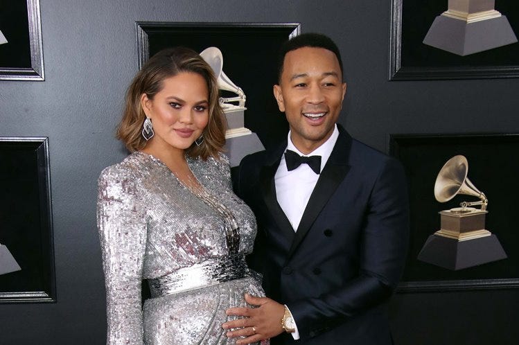 Jan 28, 2018; New York, NY, USA; Chrissy Teigen (L) and John Legend arrive at the 60th Annual Grammy Awards at Madison Square Garden Jan 28, 2018; New York, NY, USA; Chrissy Teigen (L) and John Legend arrive at the 60th Annual Grammy Awards at Madison Square Garden