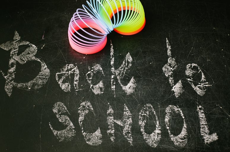 chalk with words back to school. Classroom, beginning. chalk with words back to school. Classroom, beginning.