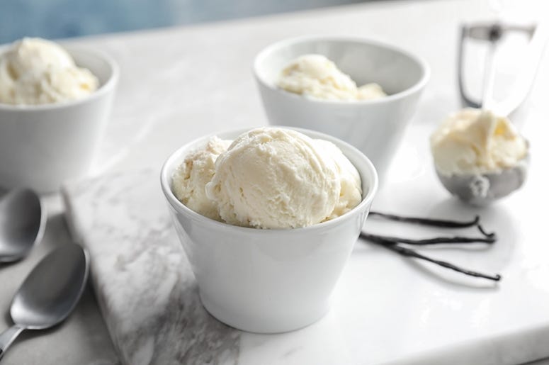 Bowls with tasty vanilla ice cream. Bowls with tasty vanilla ice cream.