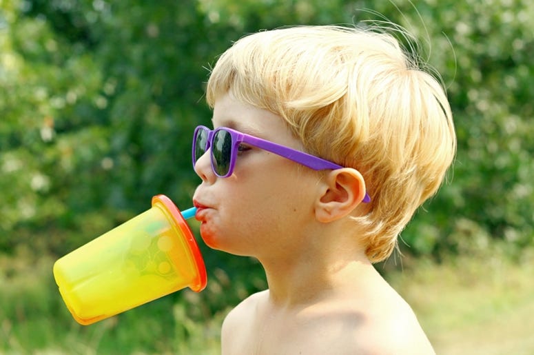 Child Drinking on Hot Summer Day Child Drinking on Hot Summer Day
