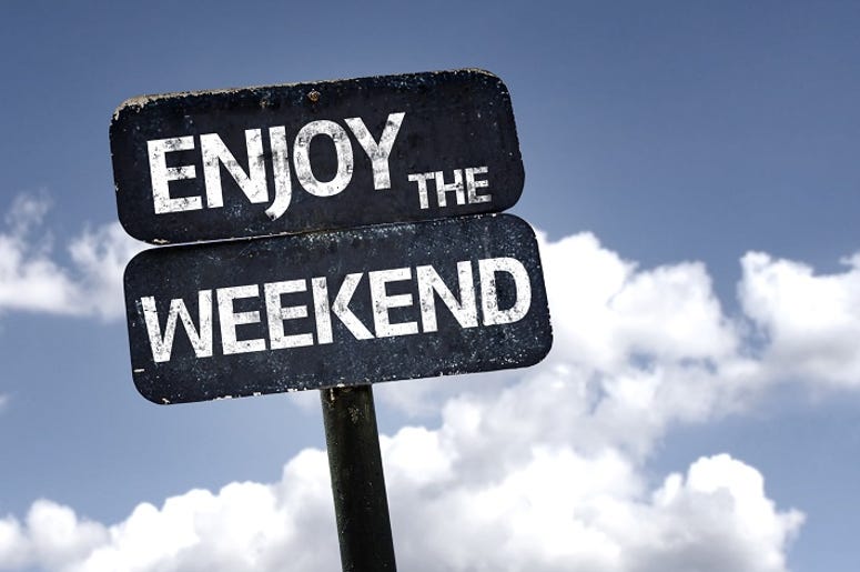 Enjoy the Weekend sign with clouds and sky background Enjoy the Weekend sign with clouds and sky background
