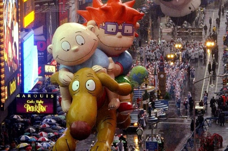 NEW YORK, NY., November 26 -- The Rugrats float makes its way through Times Square during the 72nd annual Macy's Thanksgiving Day Parade Thursday in New York. (NY) NEW YORK, NY., November 26 -- The Rugrats float makes its way through Times Square during the 72nd annual Macy's Thanksgiving Day Parade Thursday in New York. (NY)