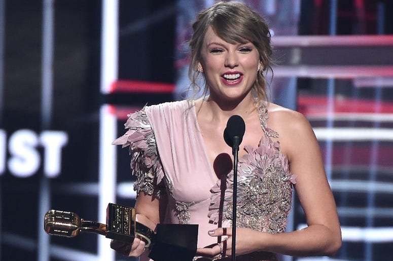 Taylor Swift accepts an award at the 2018 Billboard Music Awards at MGM Grand Garden Arena on May 20, 2018 in Las Vegas, Nevada. Taylor Swift accepts an award at the 2018 Billboard Music Awards at MGM Grand Garden Arena on May 20, 2018 in Las Vegas, Nevada.