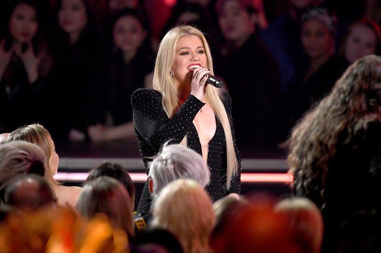 (Kevin Winter/ Getty Images) Kelly Clarkson speaks onstage during the 2019 Billboard Music Awards