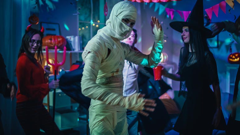 (Gorodenkoff/ iStock/ Getty Images Plus) Mummy, Zombie, Devil, Witch in a room