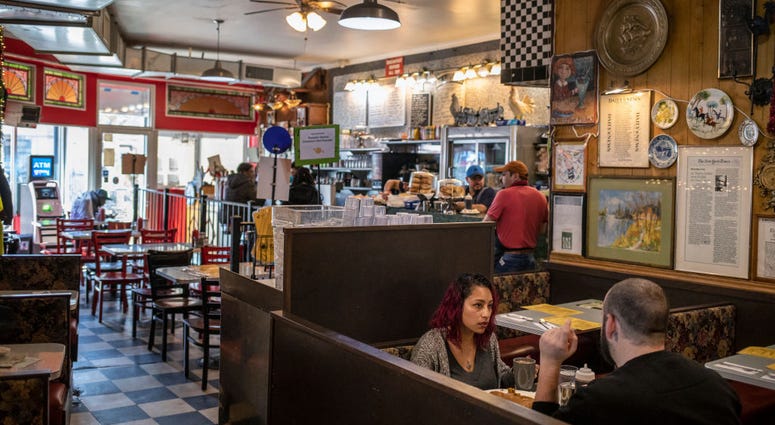 NEW YORK, NY - MARCH, 16: Patrons eat at Tom's Restaurant in the Prospect Heights neighborhood of Brooklyn on March 16, 2020 in New York City. In another measure to try and contain the spread of the Coronavirus all bars and restaurants were ordered to clo NEW YORK, NY - MARCH, 16: Patrons eat at Tom's Restaurant in the Prospect Heights neighborhood of Brooklyn on March 16, 2020 in New York City. In another measure to try and contain the spread of the Coronavirus all bars and restaurants were ordered to clo