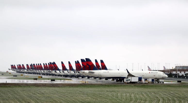 Planes belonging to Delta Air Lines sit idle at Kansas City International Airport on April 03, 2020 in Kansas City, Missouri.