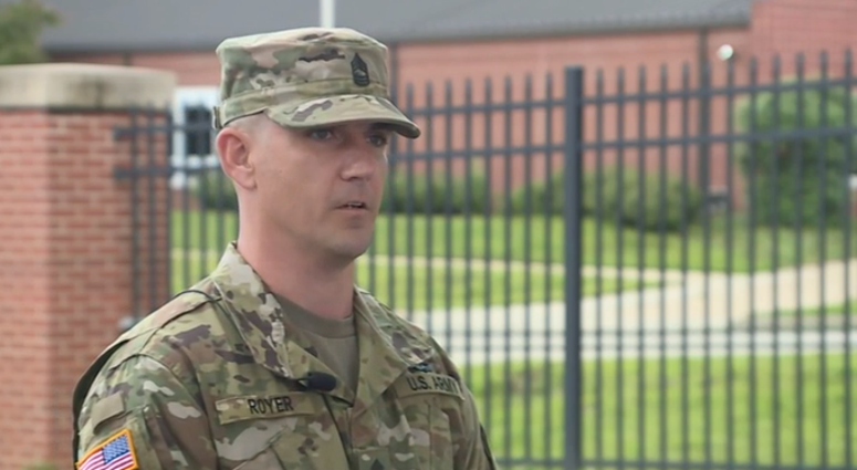 Master Sergeant David Royer speaks to reporters the day after running over a gunman on the Centennial Bridge in Leavenworth, Kansas.