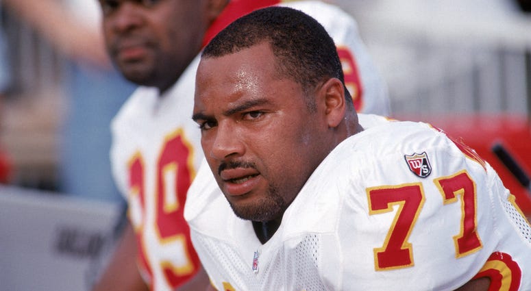Defensive end Pellom McDaniels #77 of the Kansas City Chiefs takes a rest on the bench during a game against the Oakland Raiders at the Oakland/Alameda County Coliseum on December 3, 1995 in Oakland, California. The Chiefs won 29-23.