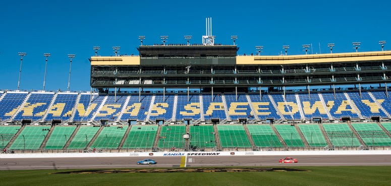 Oct 20, 2018; Kansas City, KS, USA; Cars run laps during practice for the Hollywood Casino 400 at Kansas Speedway. Mandatory Credit: Amy Kontras-USA TODAY Sports