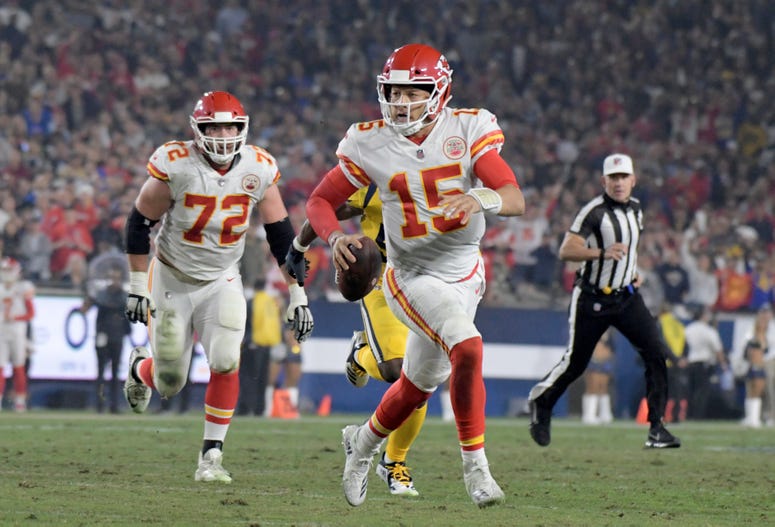 Nov 19, 2018; Los Angeles, CA, USA; Kansas City Chiefs quarterback Patrick Mahomes (15) runs against the Los Angeles Rams during the first half at the Los Angeles Memorial Coliseum. Credit: Kirby Lee-USA TODAY Sports