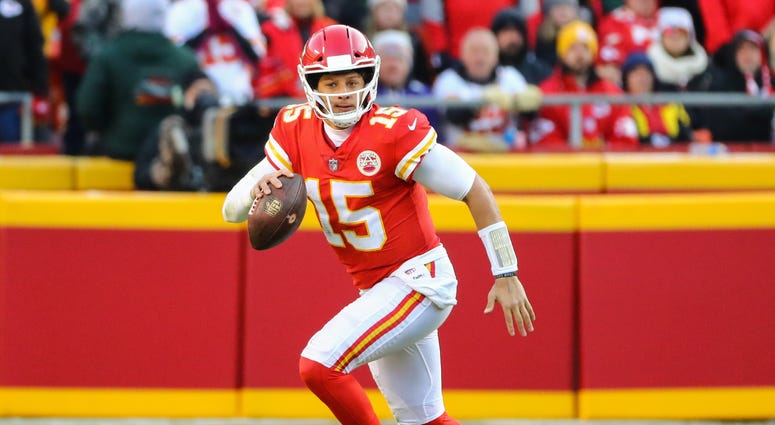 Dec 9, 2018; Kansas City, MO, USA; Kansas City Chiefs quarterback Patrick Mahomes (15) against the Baltimore Ravens at Arrowhead Stadium. Mandatory Credit: Jay Biggerstaff-USA TODAY Sports
