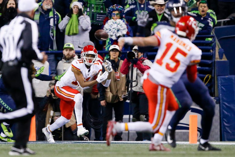 Dec 23, 2018; Seattle, WA, USA; Kansas City Chiefs wide receiver Demarcus Robinson (11) catches an 11-yard touchdown pass from quarterback Patrick Mahomes (15) during the fourth quarter against the Seattle Seahawks at CenturyLink Field. Mandatory Credit:
