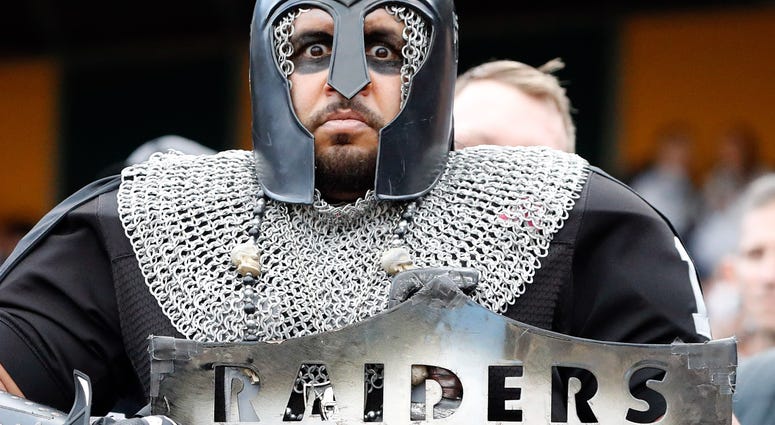 Dec 15, 2019; Oakland, CA, USA; A costumed Oakland Raiders fan poses for a photo during the first quarter of the game between the Oakland Raiders and the Jacksonville Jaguars at Oakland Coliseum. Mandatory Credit: Darren Yamashita-USA TODAY Sports