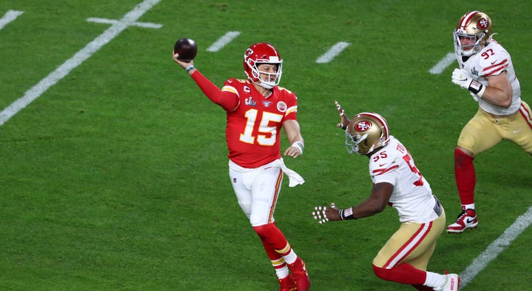 Feb 2, 2020; Miami Gardens, Florida, USA; Kansas City Chiefs quarterback Patrick Mahomes (15) throws on the run in Super Bowl LIV at Hard Rock Stadium. Mandatory Credit: Kim Klement-USA TODAY Sports Feb 2, 2020; Miami Gardens, Florida, USA; Kansas City Chiefs quarterback Patrick Mahomes (15) throws on the run in Super Bowl LIV at Hard Rock Stadium. Mandatory Credit: Kim Klement-USA TODAY Sports