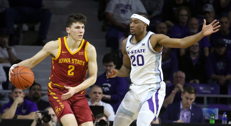 Mar 7, 2020; Manhattan, Kansas, USA; Iowa State Cyclones guard Caleb Grill (2) is guarded by Kansas State Wildcats forward Xavier Sneed (20) during the first half at Bramlage Coliseum. Scott Sewell-USA TODAY Sports Mar 7, 2020; Manhattan, Kansas, USA; Iowa State Cyclones guard Caleb Grill (2) is guarded by Kansas State Wildcats forward Xavier Sneed (20) during the first half at Bramlage Coliseum. Scott Sewell-USA TODAY Sports