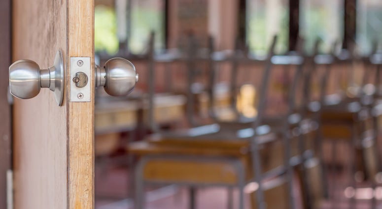 And open door shows an empty classroom
