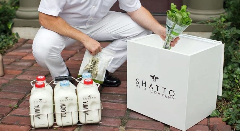 promotional image of milkman delivering milk and produce