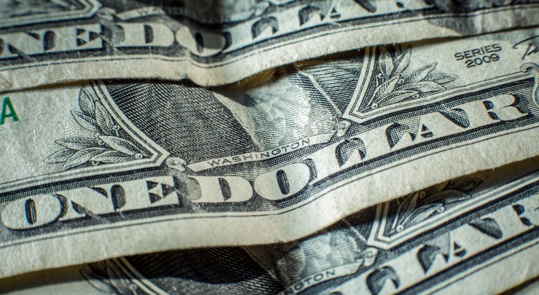 a close up of dollar bills