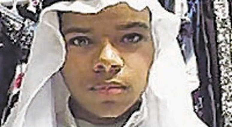 John T Booker appears in Muslim garb