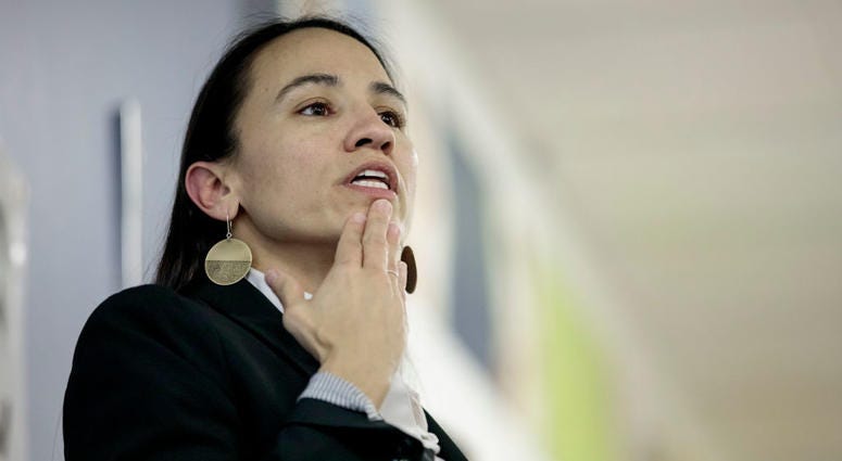 Kansas Rep. Sharice Davids speaks before a gathering