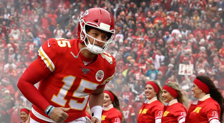 Patrick Mahomes of the Kansas City Chiefs runs onto the field