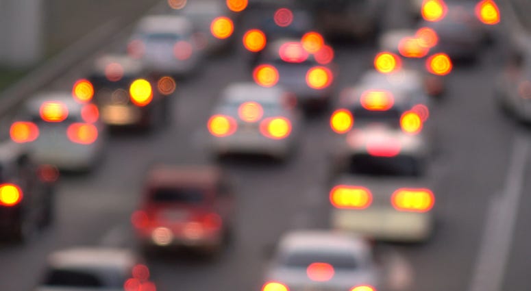 cars seen from behind in a traffic jam