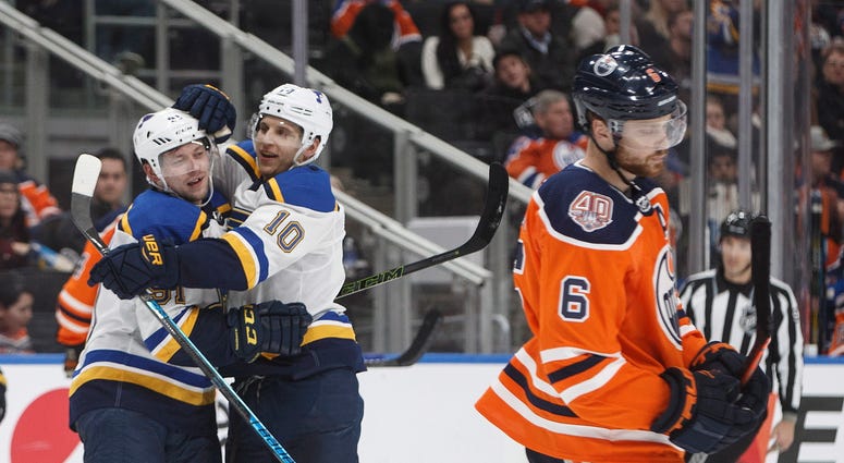 St. Louis Blues' Vladimir Tarasenko (91) and Brayden Schenn (10) celebrate a goal St. Louis Blues' Vladimir Tarasenko (91) and Brayden Schenn (10) celebrate a goal