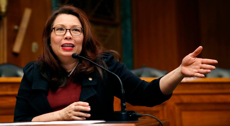 In this Feb. 14, 2018, photo, Sen. Tammy Duckworth, D-Ill., speaks to Goldman Sachs 10,000 Small Businesses Summit, on Capitol Hill, in Washington.