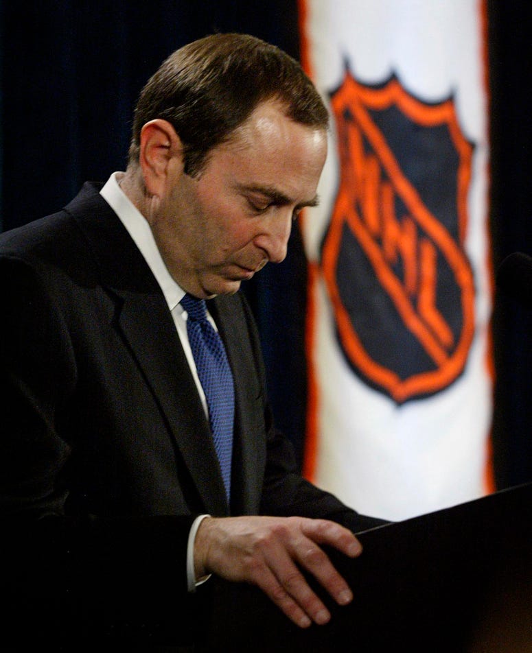 2005, file photo, NHL commissioner Gary Bettman listens to a question after announcing the cancellation of the current hockey season. 2005, file photo, NHL commissioner Gary Bettman listens to a question after announcing the cancellation of the current hockey season.