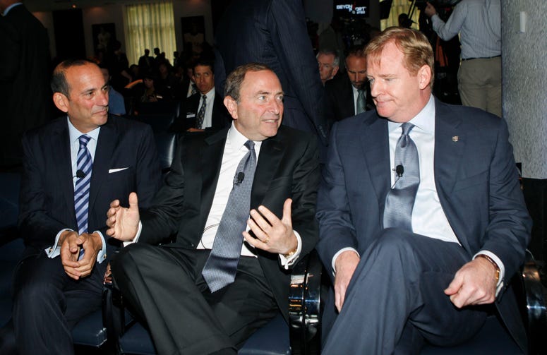 Major League Soccer Commissioner Don Garber, left, listens as National Hockey League Commissioner Gary Bettman, center, and National Football League Commissioner Roger Goodell. Major League Soccer Commissioner Don Garber, left, listens as National Hockey League Commissioner Gary Bettman, center, and National Football League Commissioner Roger Goodell.