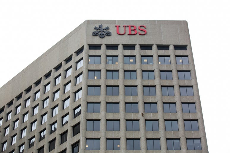 A raccoon scales the side of the UBS Tower in downtown St. Paul, Minn., on Tuesday, June 12, 2018.