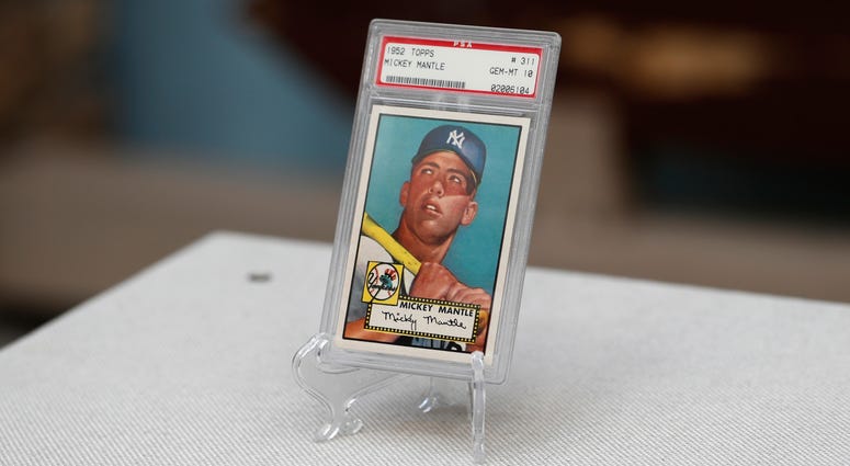 The "Holy Grail" of baseball cards, a 1952 Topps Mickey Mantle that is valued at more than $10 million The "Holy Grail" of baseball cards, a 1952 Topps Mickey Mantle that is valued at more than $10 million