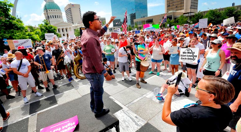 Wesley Bell In this June 30, 2018, photo, Wesley Bell, a candidate for St. Louis County Prosecuting Attorney, addresses the crowd during a protest about the Trump Administration's policy of family separation and detention at Kiener Plaza in downtown St. Louis. St. Lo
