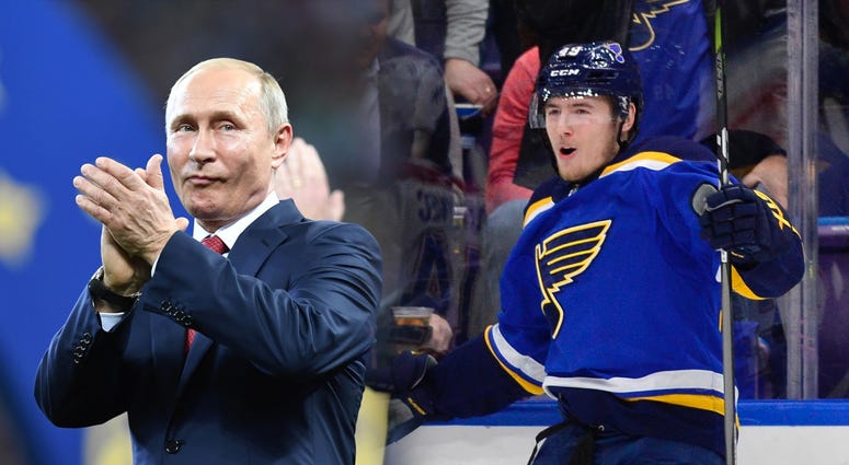 Russian President Vladimir Putin next to Blues forward Ivan Barbashev. Russian President Vladimir Putin next to Blues forward Ivan Barbashev.