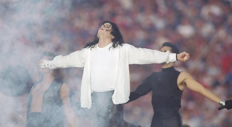 Entertainer Michael Jackson sings at half-time during the Super Bowl X XVII Entertainer Michael Jackson sings at half-time during the Super Bowl X XVII