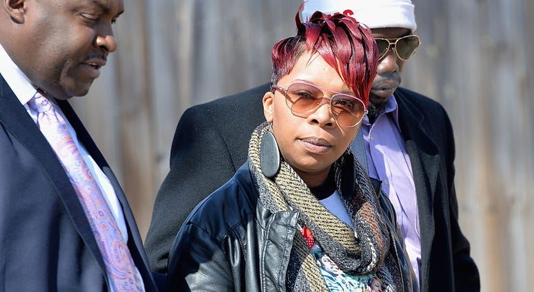 Lesley McSpadden, mother of slain teenager Michael Brown Jr., exits after a press conference at the Greater St. Mark Missionary Baptist Church on March 5, 2015 in Dellwood, Missouri.