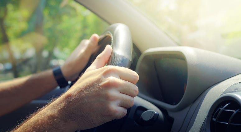 hands on steering wheel, driving