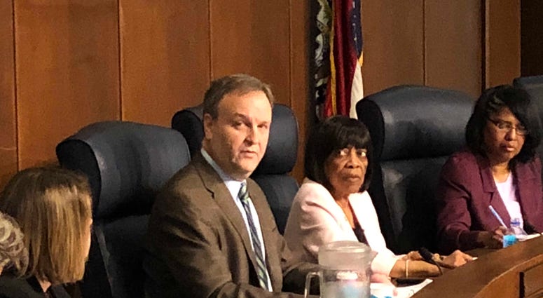 St. Louis County Executive Sam Page (center)