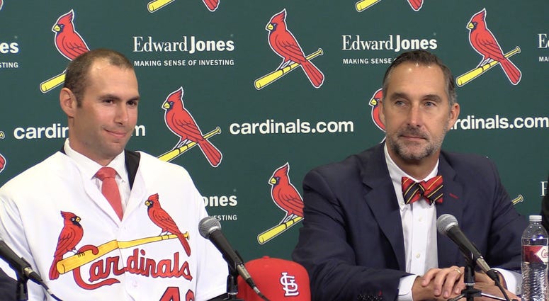Paul Goldschmidt and John Mozeliak at the Cardinals press conference. Paul Goldschmidt and John Mozeliak at the Cardinals press conference.