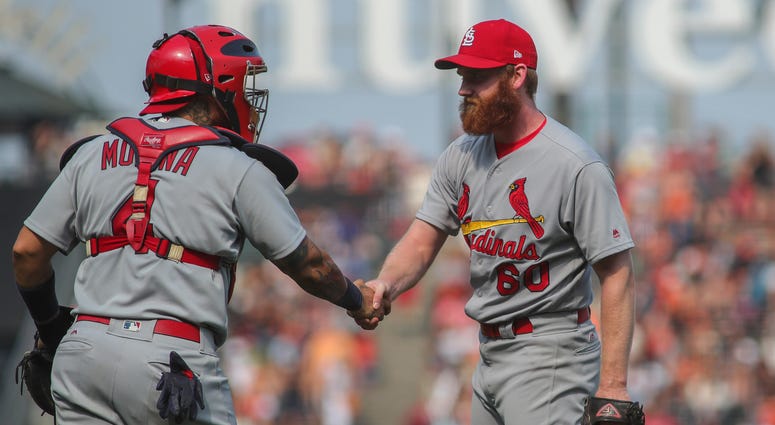 St. Louis Cardinals, John Brebbia and Yadier Molina. St. Louis Cardinals, John Brebbia and Yadier Molina.
