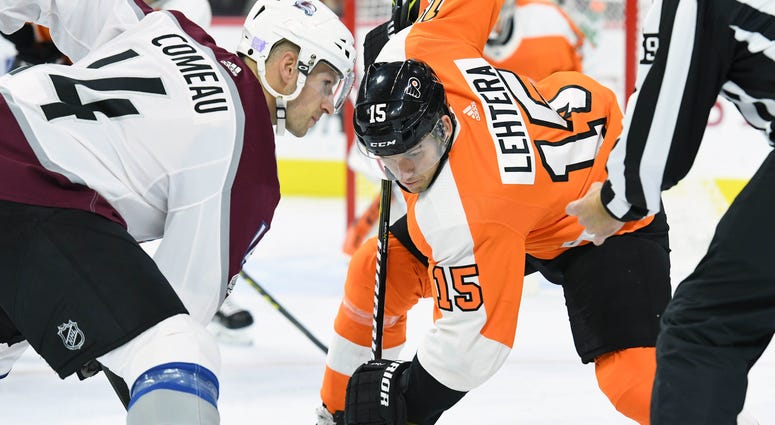 Philadelphia Flyers center Jori Lehtera (15) face-off Philadelphia Flyers center Jori Lehtera (15) face-off